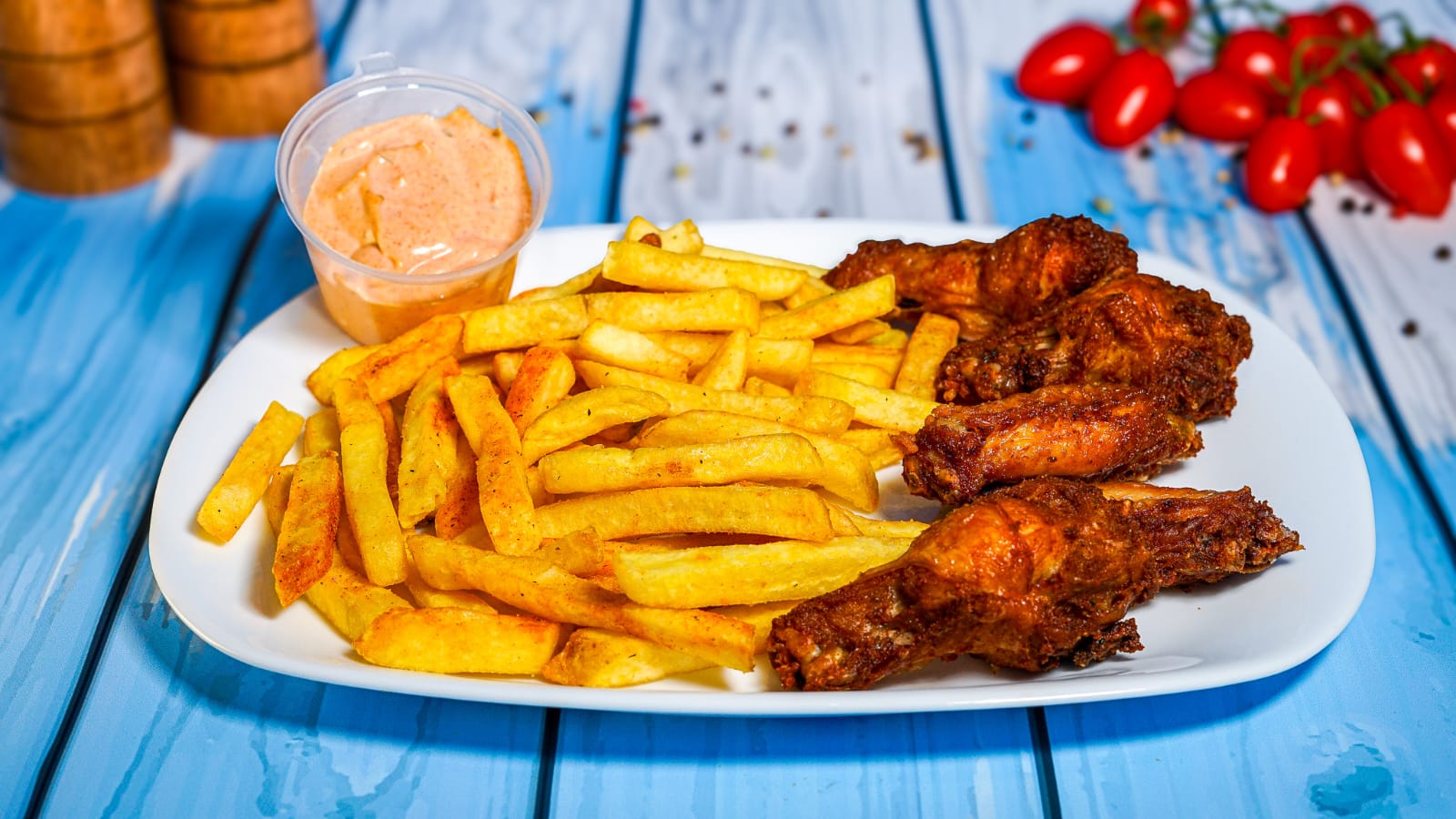 Savurează meniul 10 BBQ Wings: aripioare glazurate, cartofi crocanți și băutură la alegere!